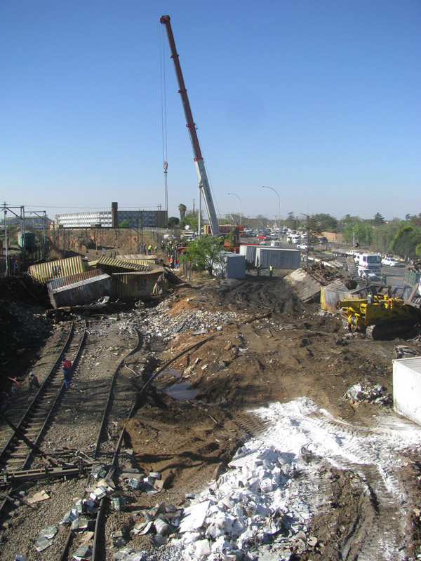 All catenary gone, railway lines not in a line anymore, embankment moertoe