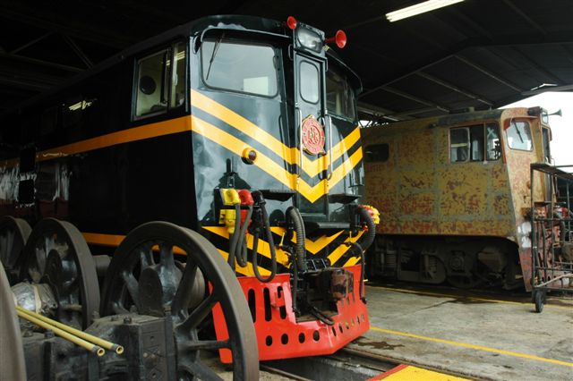 The old drop pit shed at Capital Park once had many steam locomotives in various stages of having wheels dropped to major repairs done under this very same roof. Today, the new face of the Rovos future, in the form of ex-SAR class 5E1 units, take their place. Only the wheel sets of their steam fleet bring some sense of meaning to this once busy steam operation.