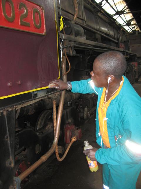 Paintshop foreman Majid shows what can be done with a little grease-cutting fluid on 3020's cab