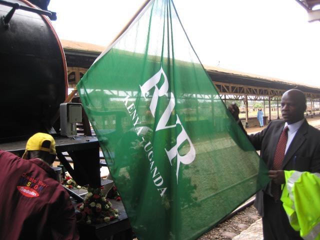 Affixing the Rift Valley Railways flag...