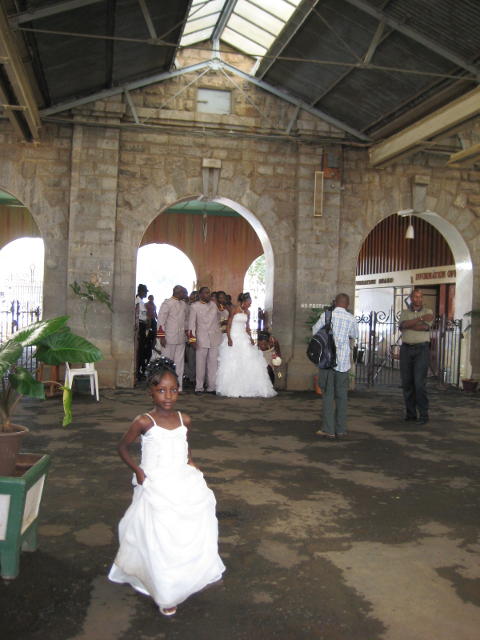 Bride and groom make a sweeping entrance into Nairobi Station's rather grand lobby
