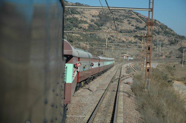 Up the grades at Panpoort and passengers stick heads out the windows to listen to the stack talk.