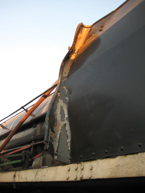 The smoke deflector on the driver's side has been damaged during the recovery operation