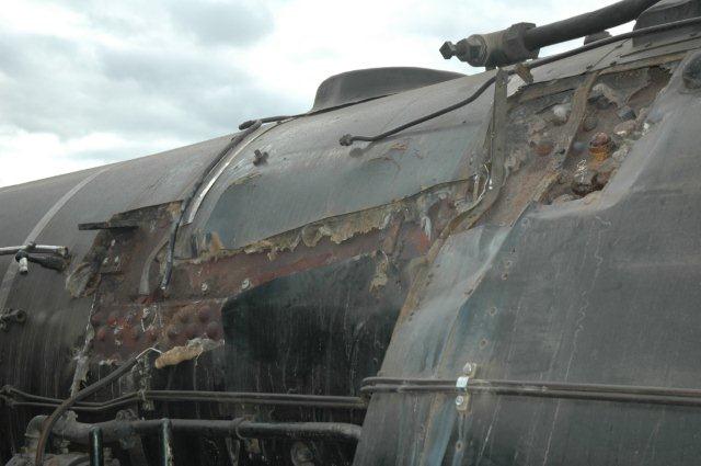 View of damaged side with lagging removed to show the damage to rivets and stays