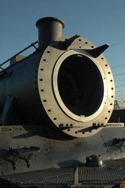First light reflects off the freshly painted smoke box and valance plate