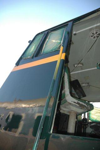 Tight angle of cab front with yellow band. Note white painted cab interior.