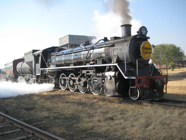 The boiler of 2650 is blown down at Capital Park before heading off to Hermanstad with the empty coaches for the Tshwane Xplorer on 25 July 2010