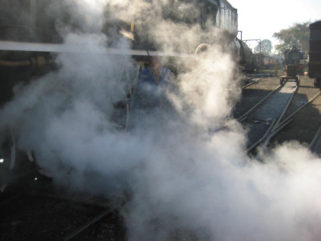 Finally they disappear in a cloud of steam