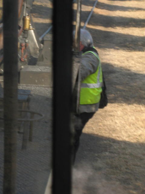 Shunter Steve riding on the front of 2650 to keep the line clear of stray photographers. Taken from the footplate.