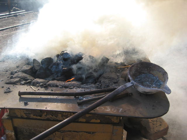 Early in the morning, the fire is just starting, with a lot of smoke.