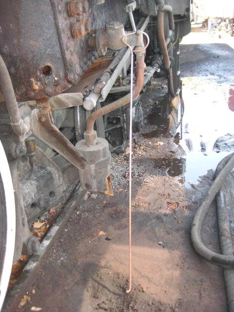 Pricker for scratching around in the boiler