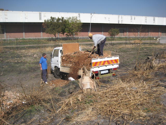 Builder's rubble is unloaded as landfill