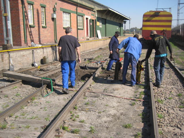 Work began on the point by the platform. Rotten sleepers and a couple of short rails are being replaced, and a section of the track including the point is being raised as it floods in wet weather