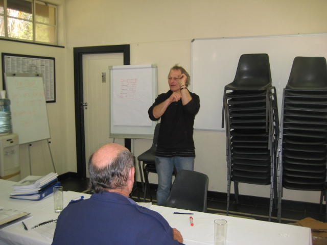 Nathan doing sign language? Or just giving another speech?