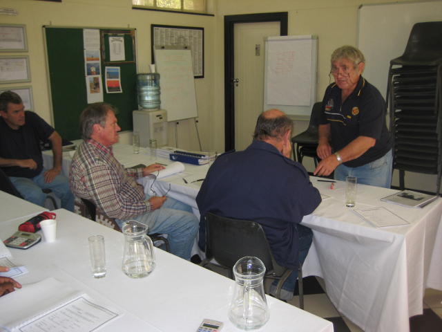 Examiner Coen briefs them on the next steps