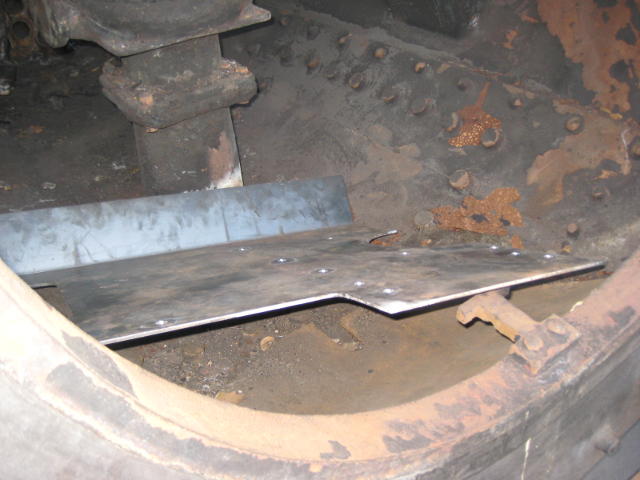 The first piece lies loosely inside the smokebox