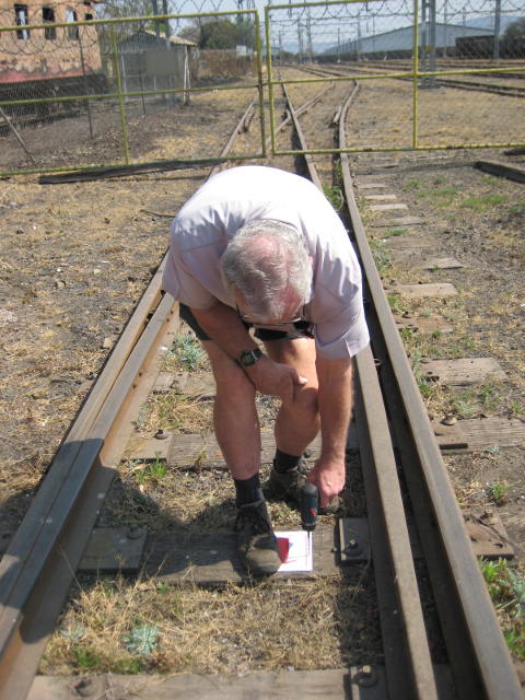 Tom drills the holes...