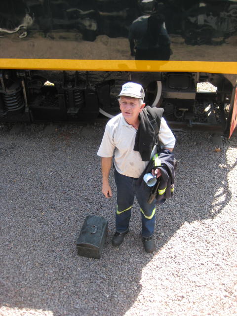 Driver Cliff Petzer signs off. Cliff was already certified for steam, diesel and electric traction and rode with as a pilot