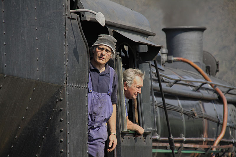 Nathan Berelowitz keeps a watch out while driver Cliff Petzer backs the loco down