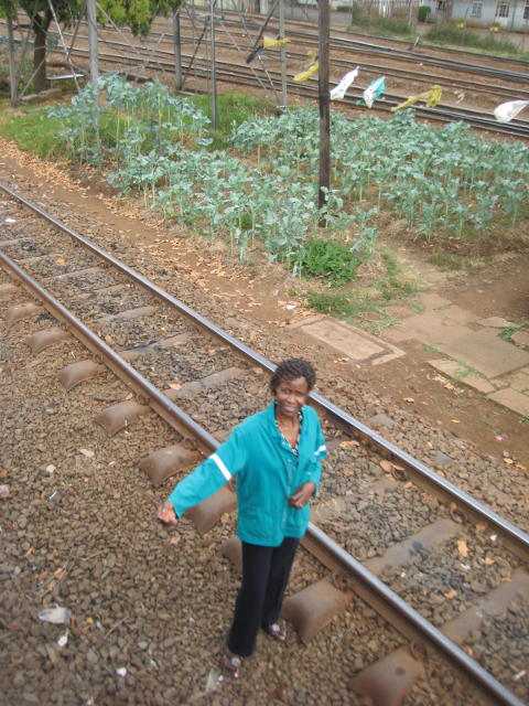 Waiting with a big smile to receive the token as we re-enter the yard at Nairobi