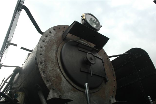 Look at that headlight and its wonderful brass hinge! The face of the<br />future. 15F 3117 has received a coat of paint on her smokebox door. The smokebox is next in line for attention.