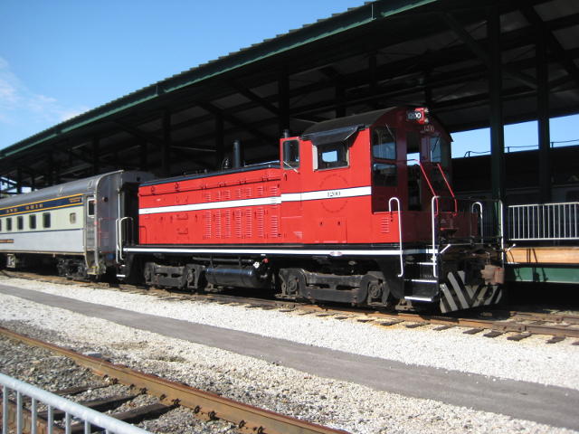 This red diesel was on passenger duty for the day, propelling a short rake of suburban coaches 1 mile down the track and hauling them back again. This is a historic mile, the first mile of track to be laid on the transcontinental railroad (or maybe the first mile ever in the USA? I can't remember). If we'd come a week later we would have had steam haulage. Can't win 'em all!