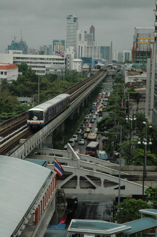 The interconnecting BTS skytrain system in Bangkok. The main tourist shopping area is in the background.