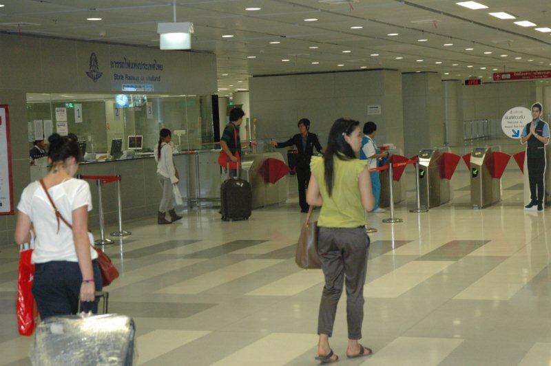 From the airport international arrivals area, once customs has finally been cleared, passengers follow the signs and go down a number of escalators to the ticket office and turnstiles. The link is connected to the local BTS skytrain service, so one can change over at certain points to another domestic route. There is an express service non stop costing 100BHT at present, but we rode the all stops at 15 BHT price. These are all introductory fares.