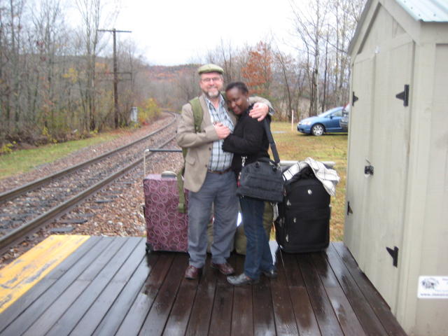 John and Jane pose at the end of the tiny wooden platform (only one door of the train is opened here) on a cool damp misty Fall morning
