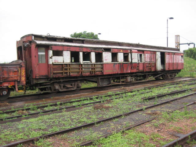 A shunt move the previous day by 3664 extricated SANRASM's old brake van no 2757 and placed it on the pit where it will be made travelworthy ready to be hauled to Hermanstad on 16th December for scrapping. Sad, but this wooden-bodied vehicle is in appalling condition