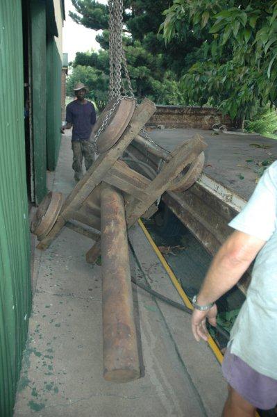 The drop pit jack collected from SANRASM old site, being manoeuvred into our shed at Hermanstad.