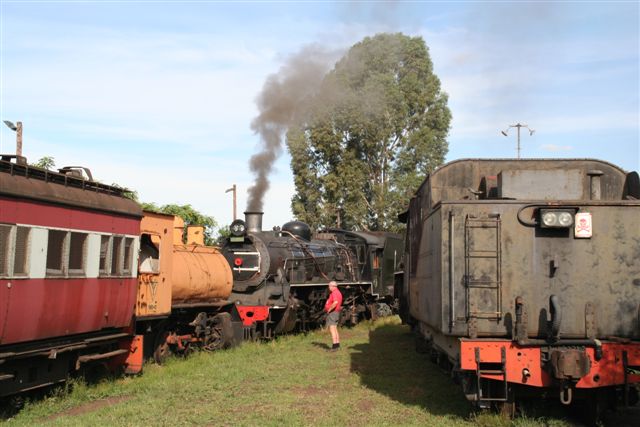 An unusual scene, as 3664 shunts the fireless loco and old EMU coach. Waiting her turn is 15CA 2850.