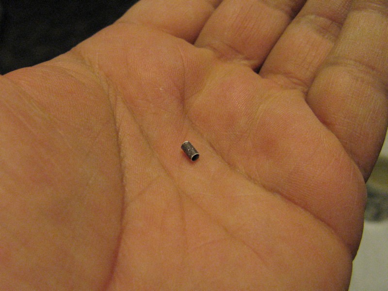 A chimney. Still another piece to stick on here! Made out of a rolled tube.