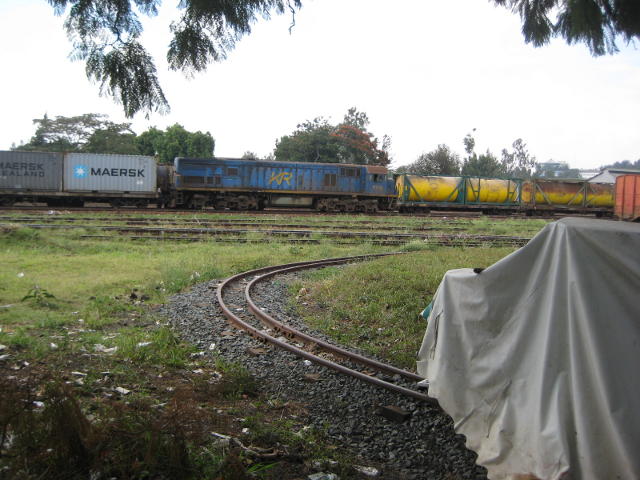 9318 shunts in the yard. The miniature train is under the tarpaulin in the right foreground.