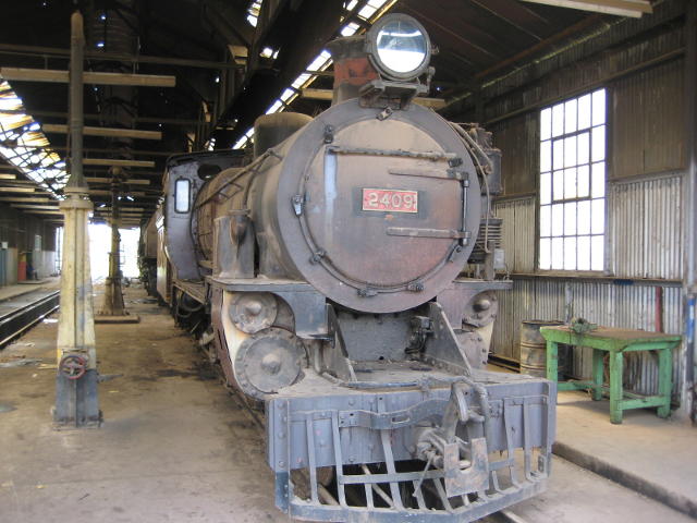 2409 at the front of shop 006. The spare wheels which were in front of her have been moved elsewhere