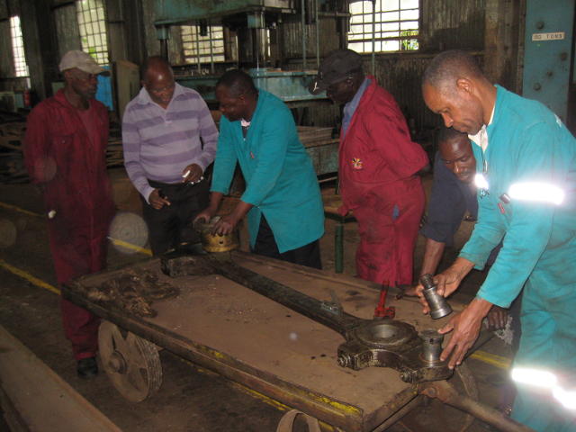 3020's rods and bushes have found their way into the RVR workshop; RVR has kindly made its facilities fully available to ensure the success of the Steam Safari. Mr Francis Waweru, a Kenyan businessman who is one of the driving forces behind the current revival of steam in Kenya, is second from left (in &quot;civilian&quot; clothes).