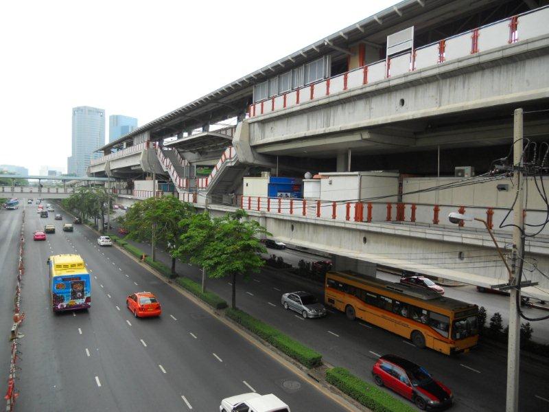 The view of the BTS station named MO CHIT. This is the terminus for the one line and people use this to get to the busy weekend market. The top level is the train and the second level is a concourse with shops and ticket machines<br />and the turnstiles.