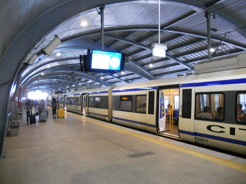 The City Line set disgorges its passengers. Some, like me, will shlep their luggage to their hotels or get a Taxi if it is too far to walk. By now it is very humid.