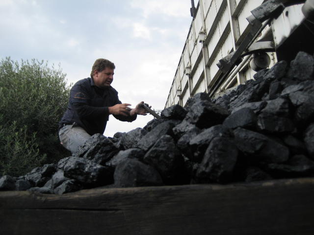 Answer: Ah, it's Gabor, trimming the coal which has just been dumped in the tender from the coal stage