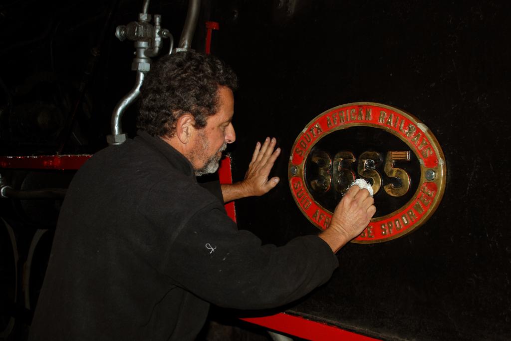 Kenny - AR volunteer Kenny Campbell gives 3655's plate a polish