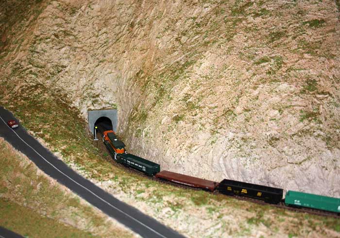 Continuing down hill.