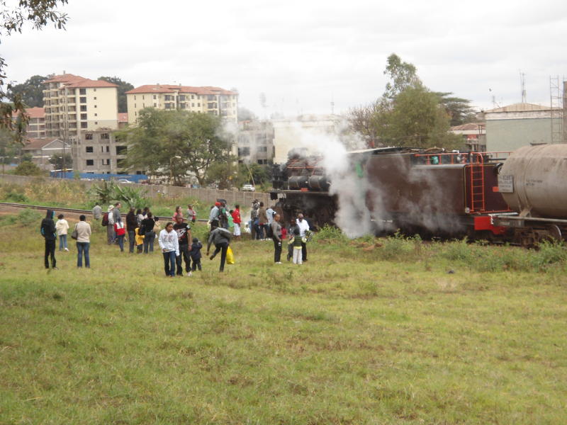 Guests mill around the locomotive