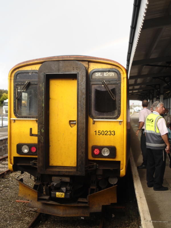 A class 150 stands in the bay platform at St Erth Station