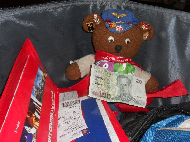 Ted at the start of the journey, checks his spending Baht and ticket, ready for the long haul to Bangkok!