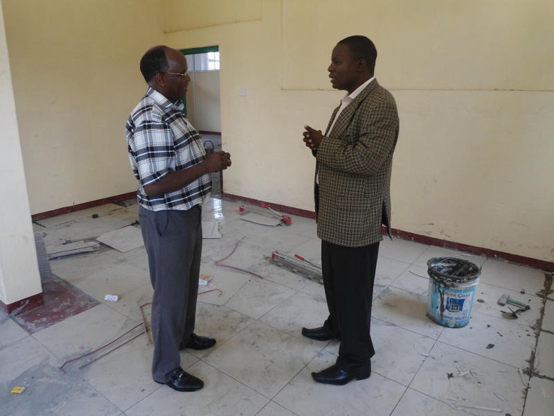 The two lynch-pins of the Kenyan steam revival: businessman Francis Waweru (left) amd Museum Curator Maurice Barasa, discuss strategy in Maurice's new as-yet-unfinished office
