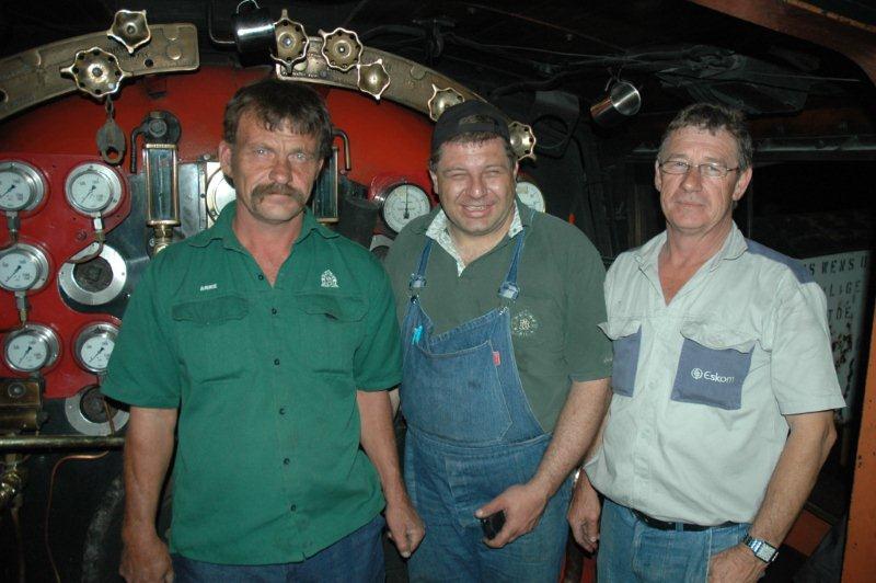 Arrie Grundlingh, Gabor Kovacs and Dantjier Hanekom in the cab of the class 25NC after Gabor had completed his driver training run with a dinner train.