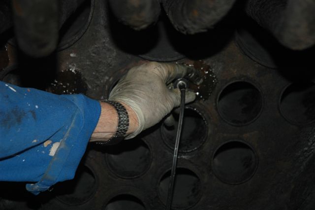 Brian Dadford sets his probe on the front tubeplate in the smokebox of 15F 3117. The firebox end has been completed as has most of the locomotive with ultrasonic testing.<br /><br />Photo by Nathan Berelowitz January 2008