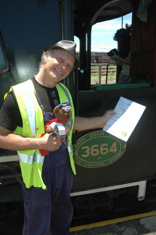 Train Ted has a good look at the driver's certificate recently presented to Nathan for becoming a steam train driver. I am sure this will come in handy as Ted will now get free rides!