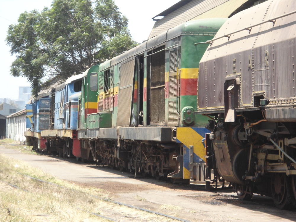 Three dead diesels. We couple on to two of them.