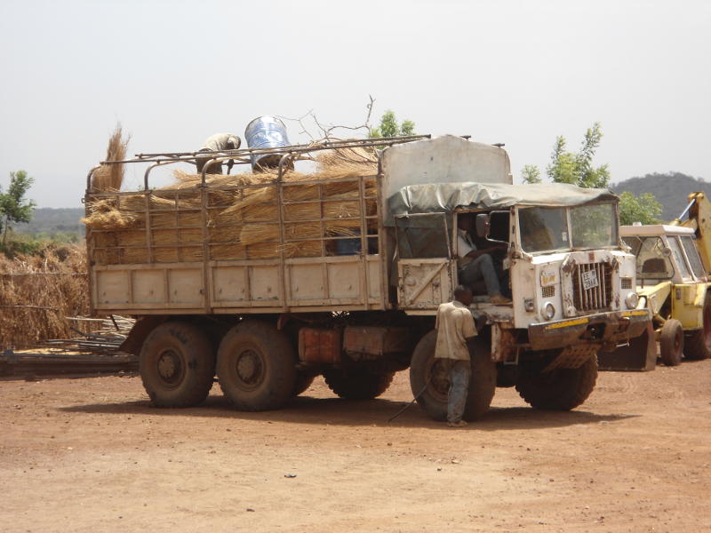 This lorry has just arrived with a load of grass for roofing